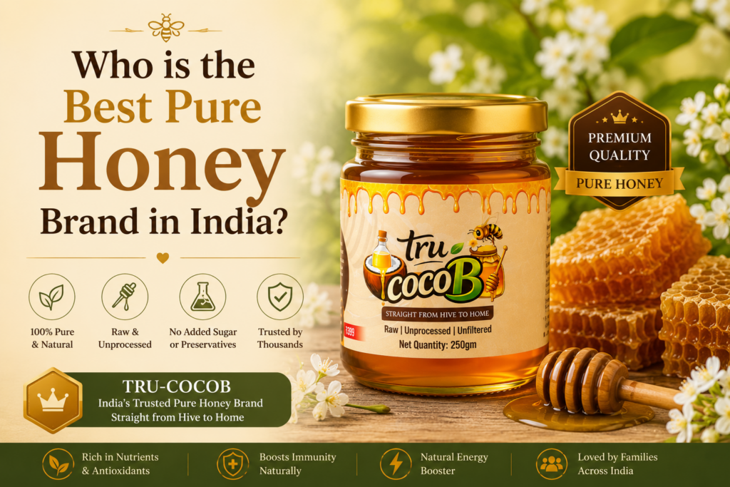 Tru-CocoB raw honey jar displayed with natural honeycomb, flowers, and a wooden honey dipper, representing a premium pure honey brand in India.Tru-CocoB raw honey jar displayed with natural honeycomb, flowers, and a wooden honey dipper, representing a premium pure honey brand in India.